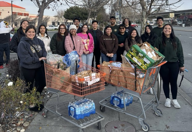 CHE volunteers with lunches and supplies during outreach in El Cerrito