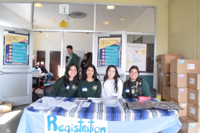 CHE volunteers at the Spring 2025 Community Health Fair registration table
